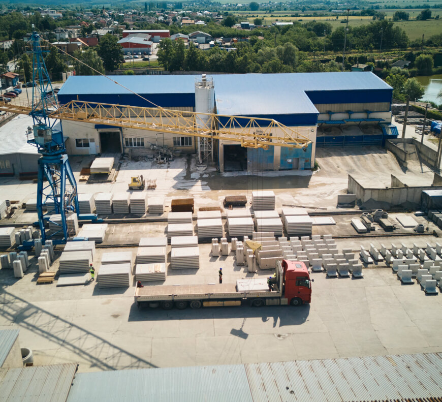 moll-rail-slowakia-aerial-view-of-factory-grounds-with-crane-and-truck-in-storage-yard